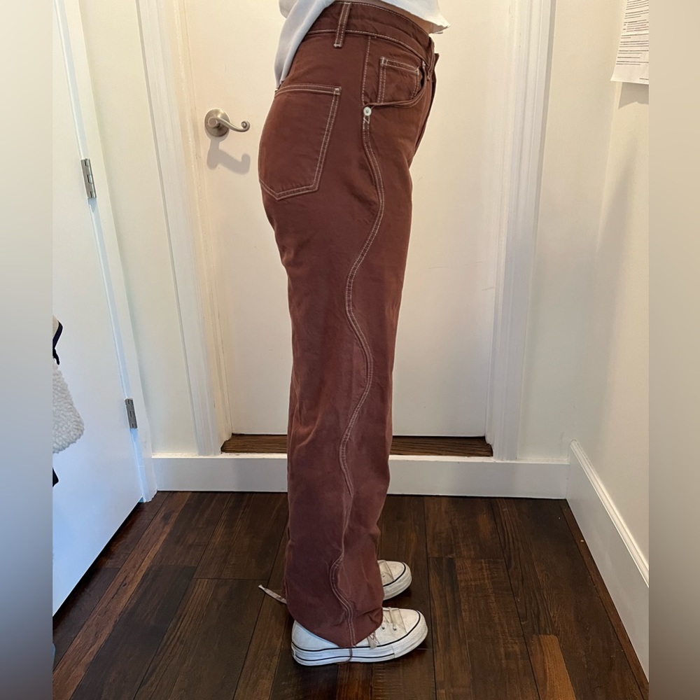 Brown Zara jeans with curvy side stitching
